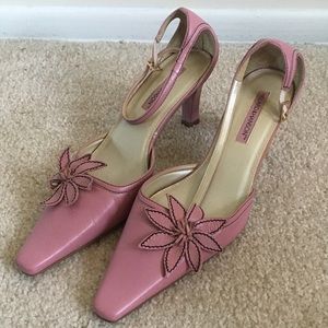 Pink heels with flower.